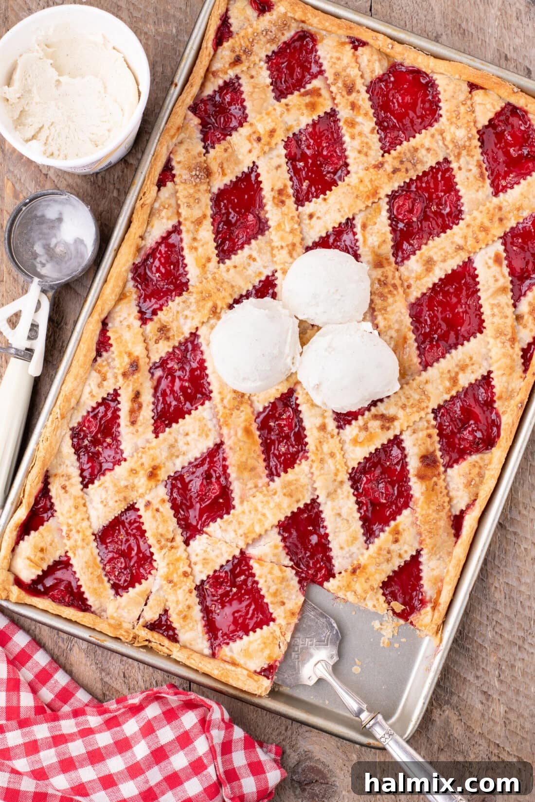 Cherry Slab Pie topped with three scoops of ice cream