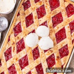 Cherry Slab Pie topped with three scoops of ice cream