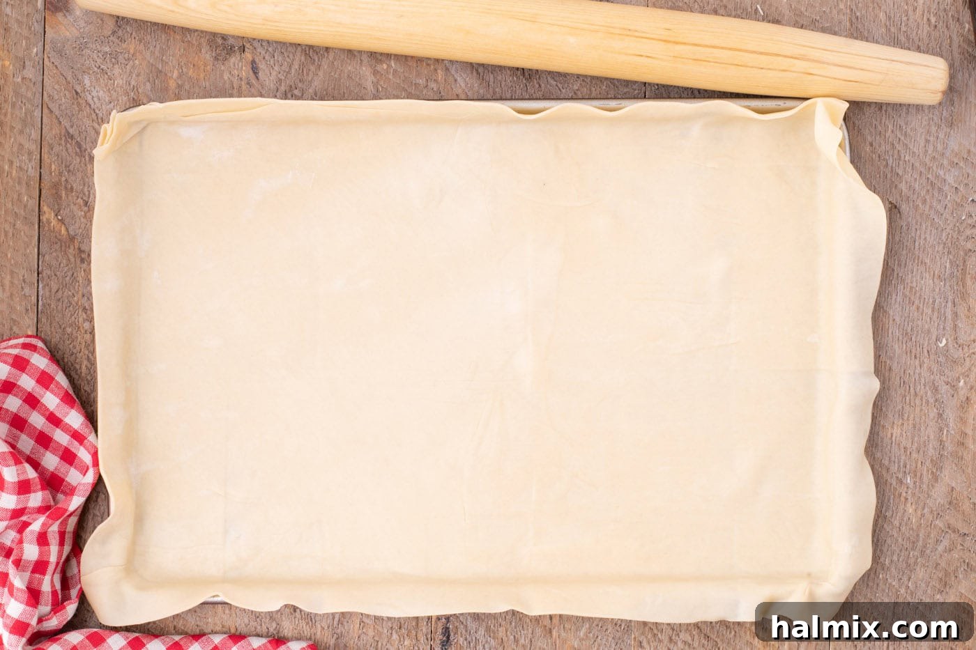 pie crust placed in a jelly roll pan