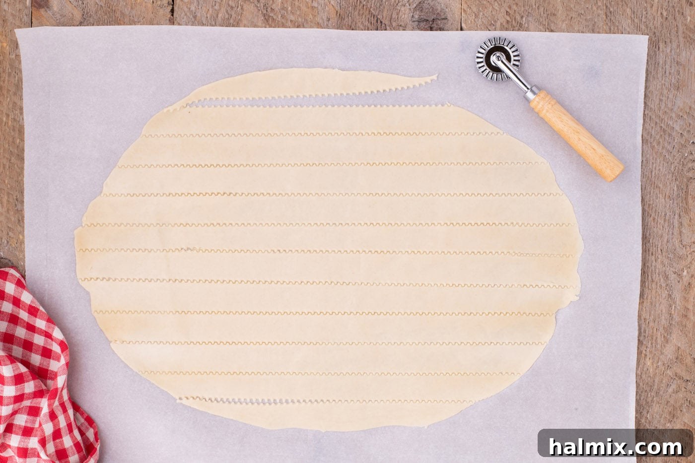 slicing strips of pie crust