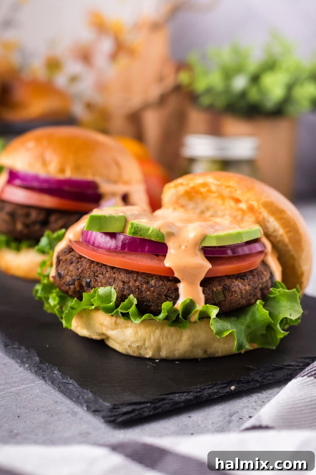 Close up photo of a Black Bean Burger with the top bun removed