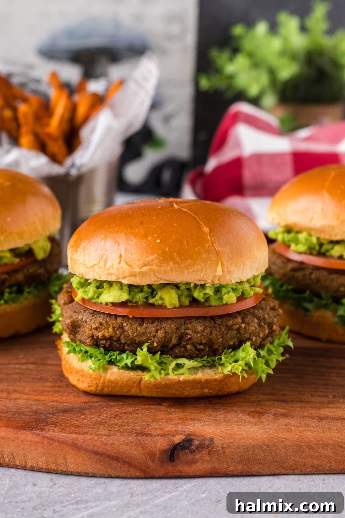 Close up photo of a Veggie Burger with more in the background