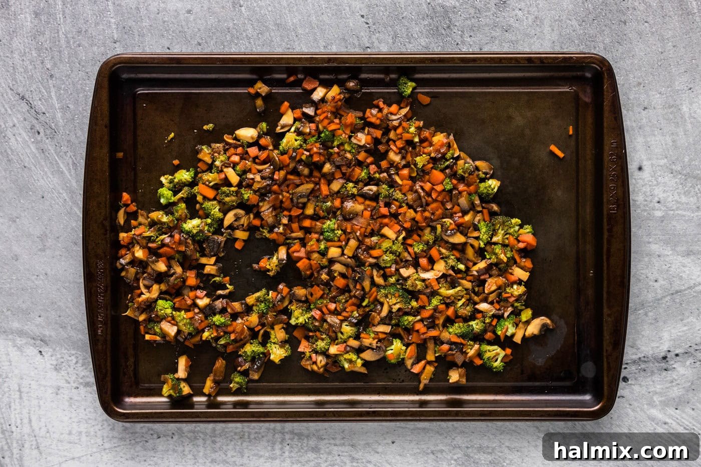 vegetable mixture cooling on a baking pan