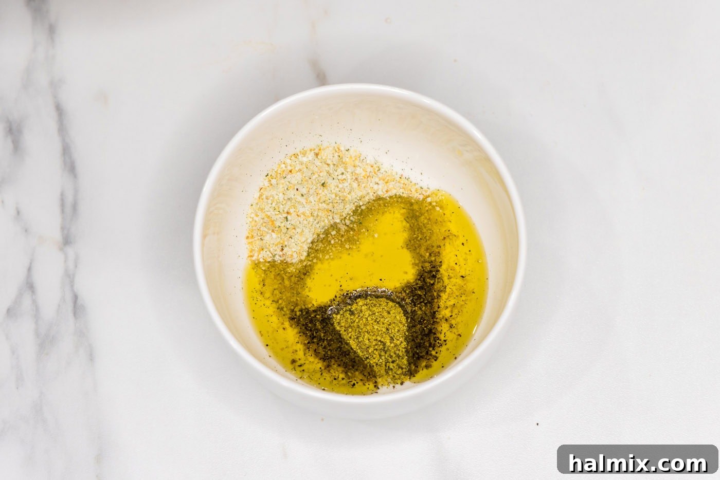 oliev oil and seasonins in a bowl