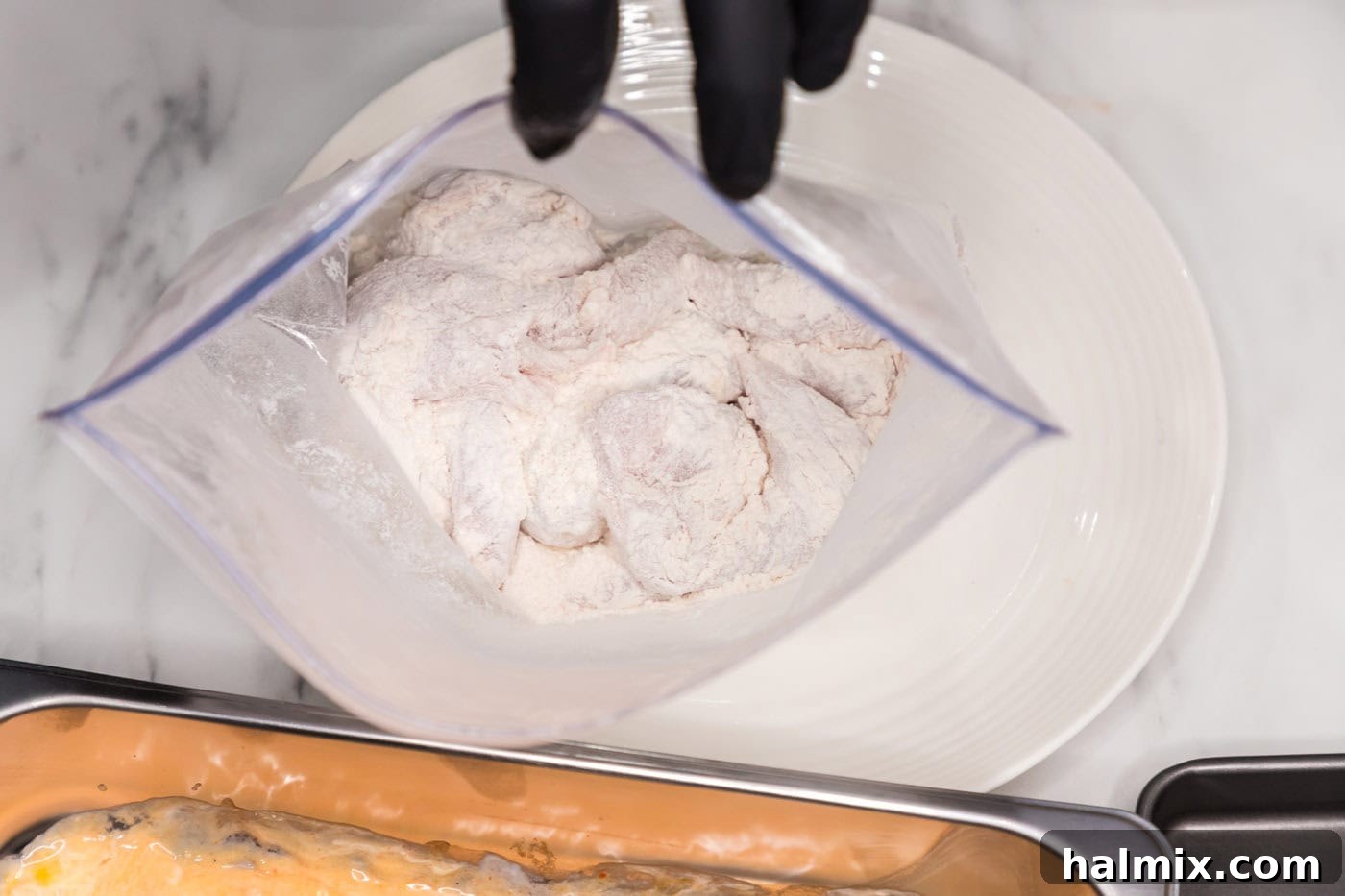 flour dredged chicken tenderloins in a bag
