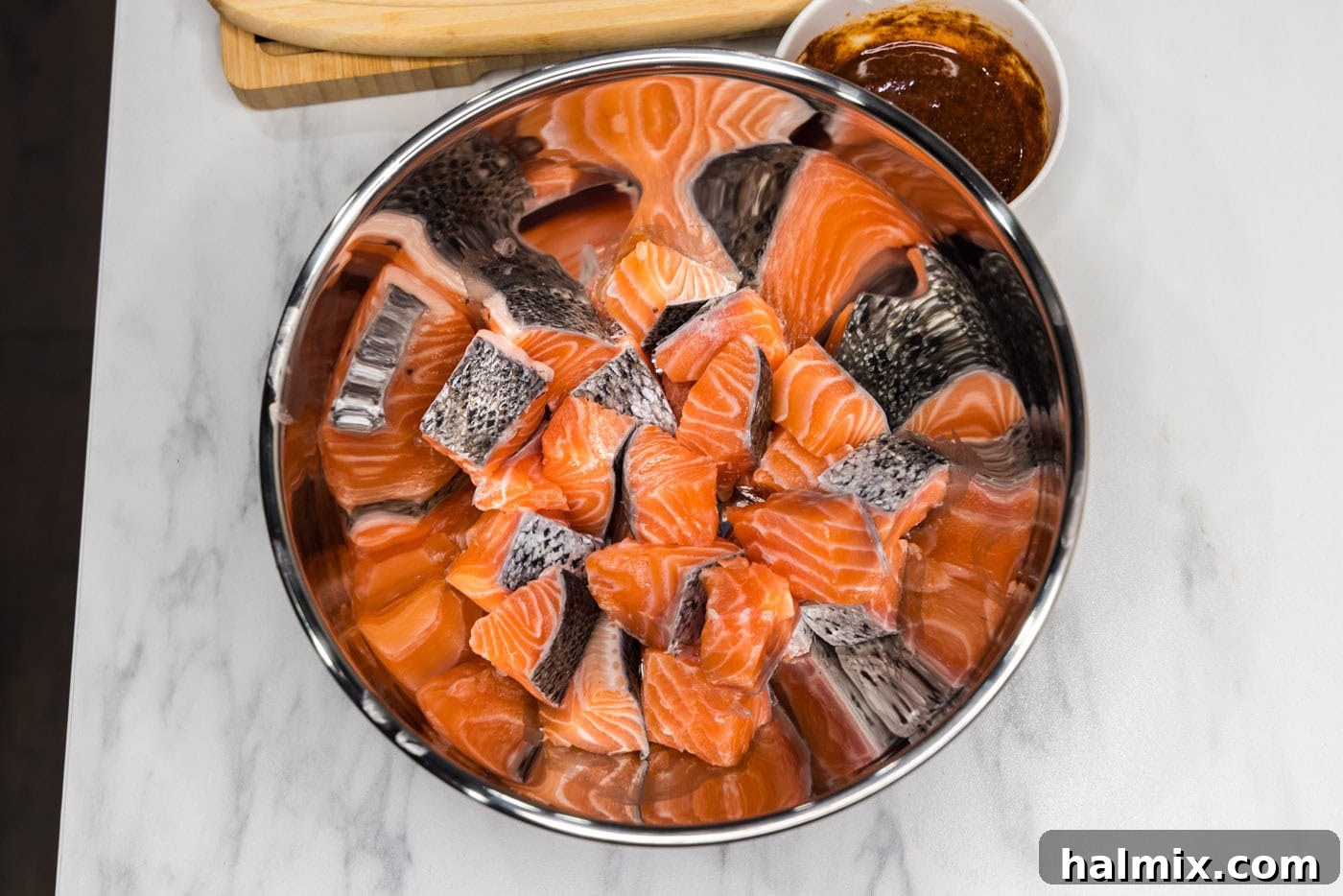 Golden Air Fryer Salmon Bites 6 salmon cubes in a bowl