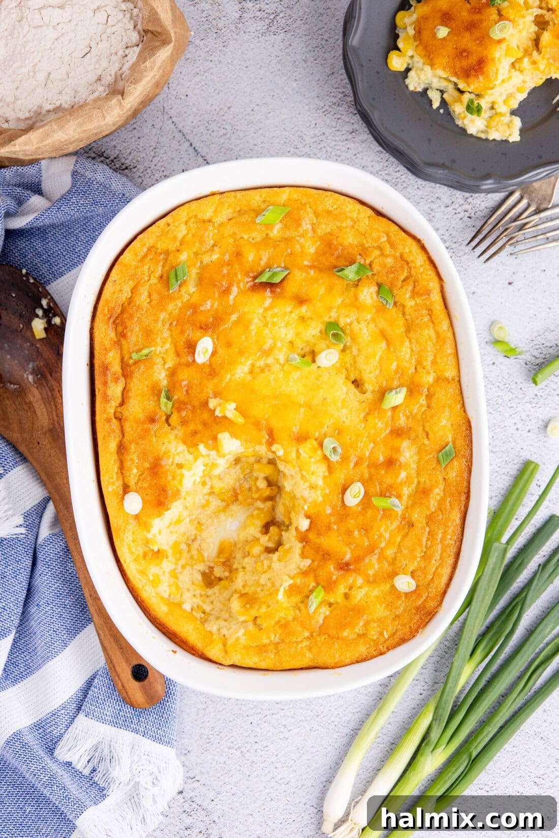 Corn Pudding in a baking dish with a serving removed