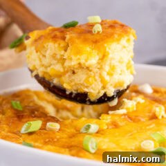 Close up photo of a scoop of Corn Pudding