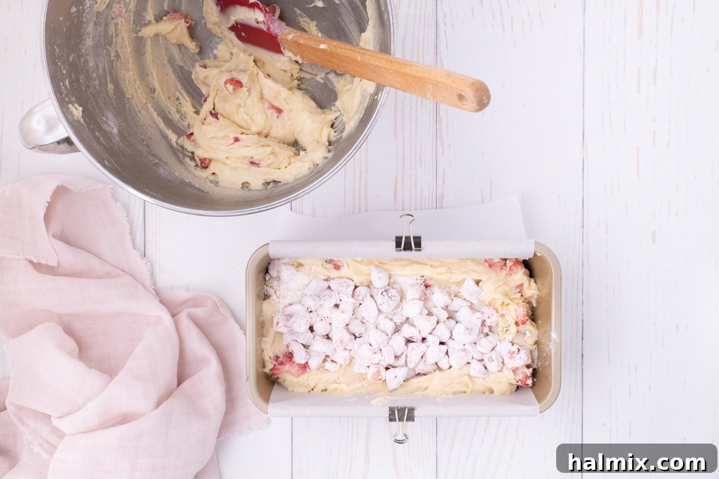 Fresh Strawberry Pound Cake 11 strawberry pound cake batter in a loaf pan topped with strawberries