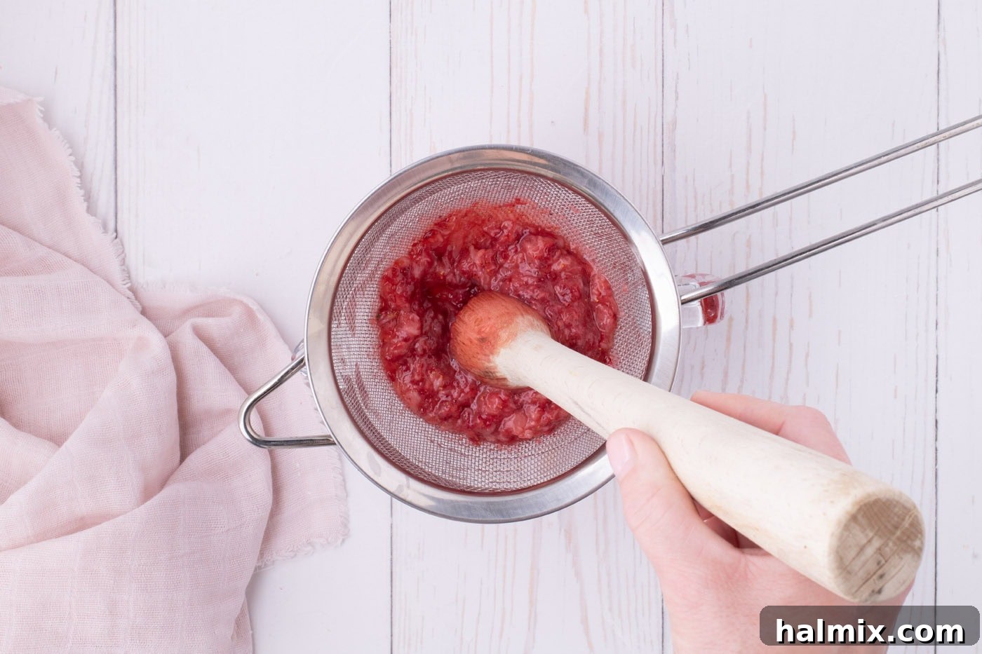 Fresh Strawberry Pound Cake 14 muddling strawberries through a fine mesh sieve