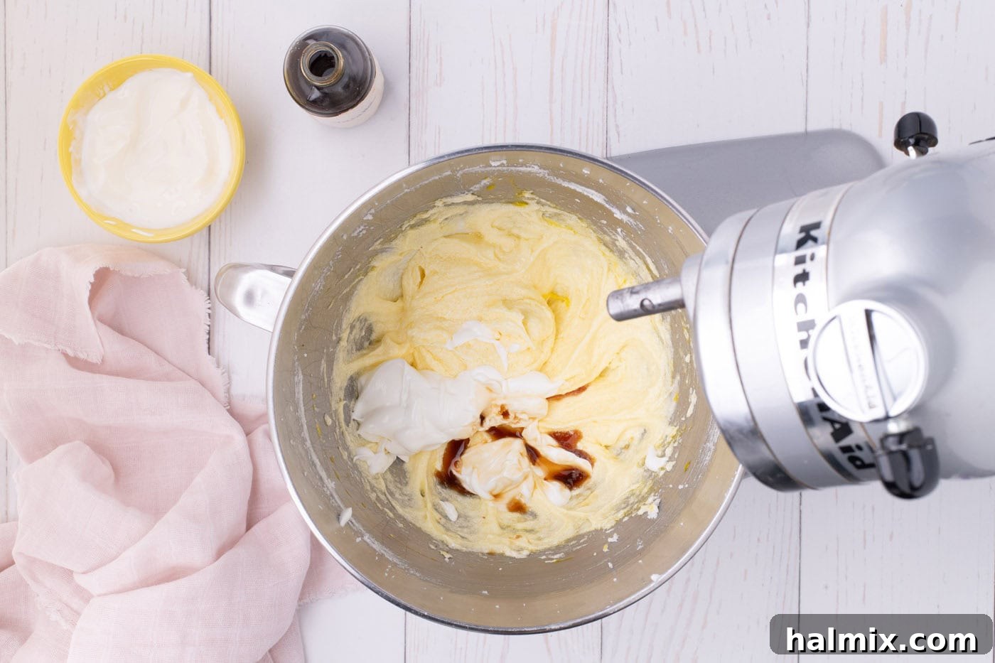 Fresh Strawberry Pound Cake 7 adding vanilla and sour cream added to creamed butter and sugar mixture in a stand mixer