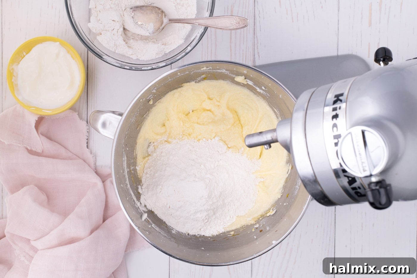 Fresh Strawberry Pound Cake 8 adding flour mixture to wet mixture in stand mixer bowl
