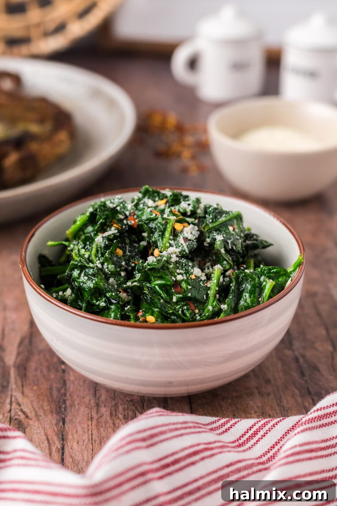 Bowl of Air Fryer Spinach, perfectly cooked and ready to serve.