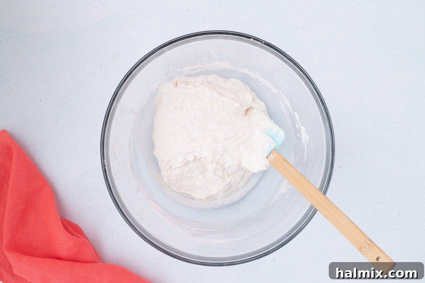 vanilla ice cream and self rising flour mixed in a bowl