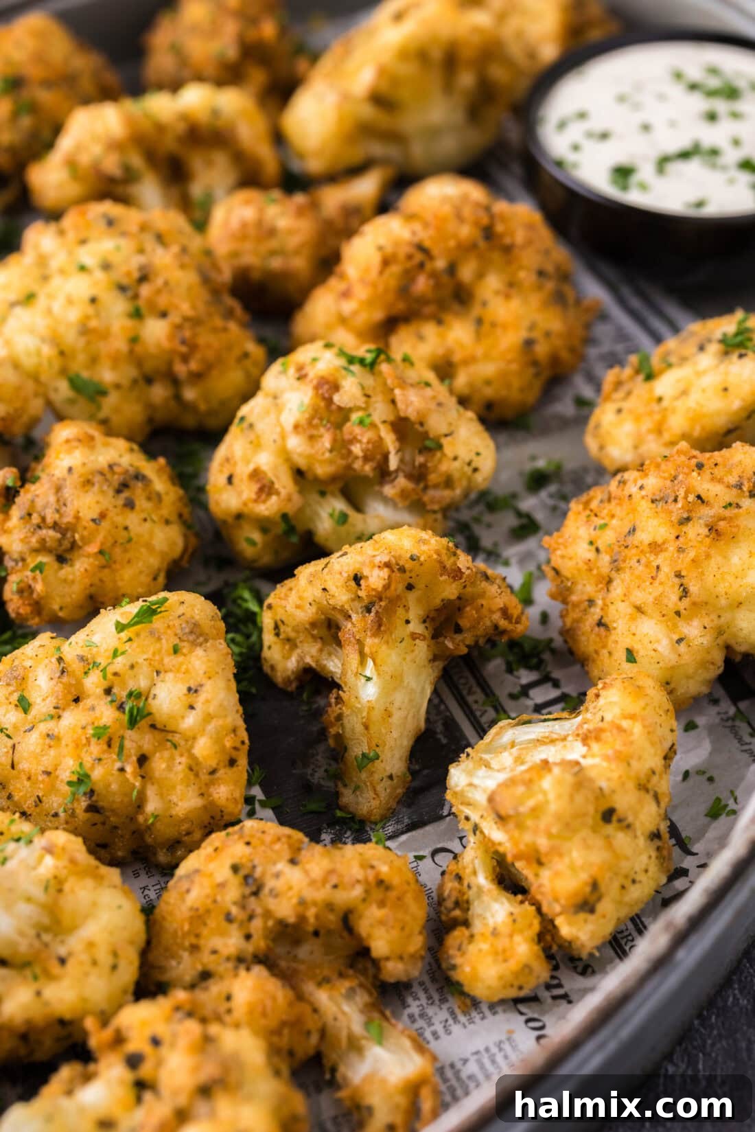 Crispy Golden Cauliflower 2 Close-up photo of a serving tray filled with golden-brown crispy fried cauliflower