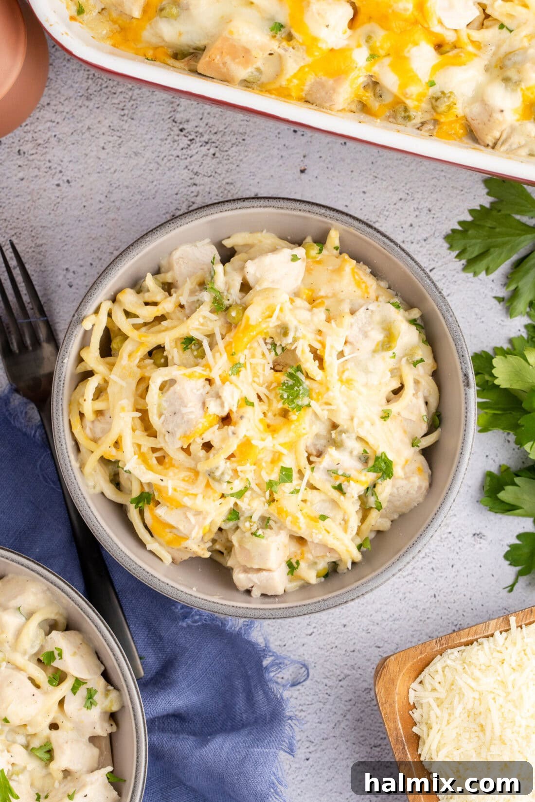 A generous bowl of Turkey Tetrazzini, showing the creamy pasta, turkey, and melted cheese, ready to be enjoyed.