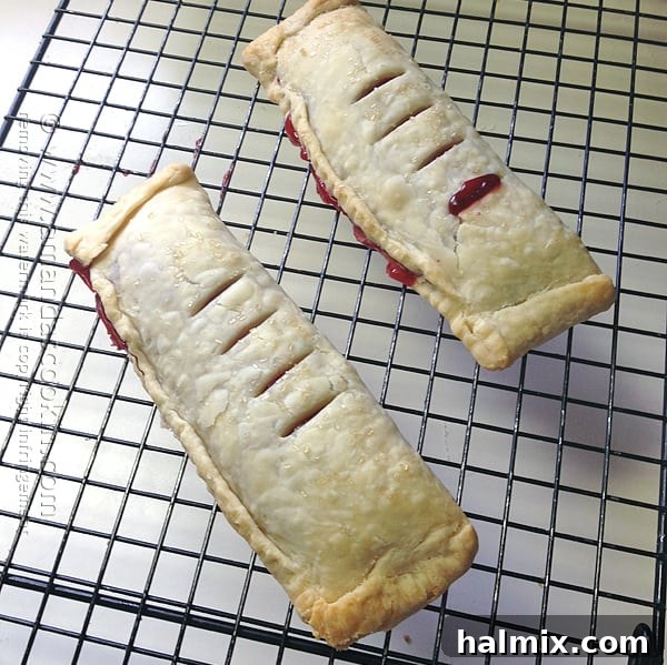 Homemade McDonald's Style Cherry Pie 13 Step-by-step: Freshly baked cherry hand pies cooling on a wire rack