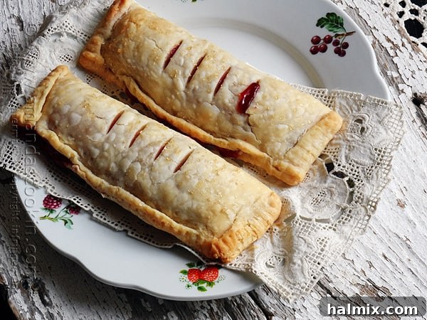 Homemade McDonald's Style Cherry Pie 4 Cherry pie filling being spooned onto a homemade pie crust