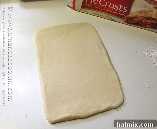 Homemade McDonald's Style Cherry Pie 6 Step-by-step: Rolling out pie dough to approximately 10x6 inches