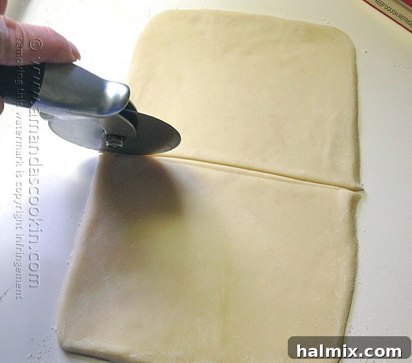 Homemade McDonald's Style Cherry Pie 7 Step-by-step: Cutting rolled pie dough into two 5x6 inch rectangles