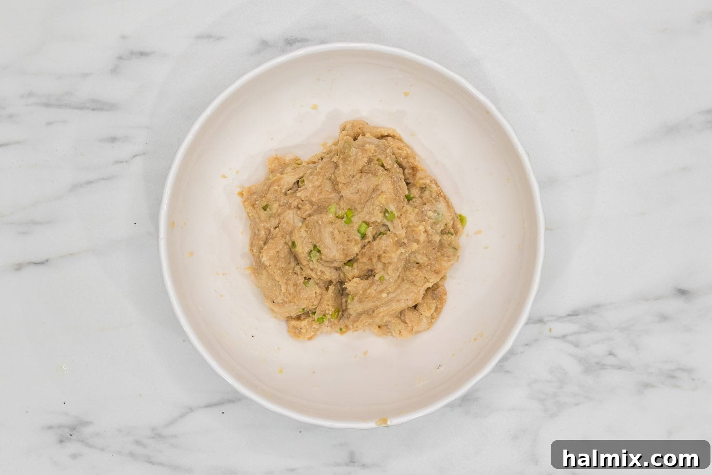 Asian chicken meatball mixture in a bowl