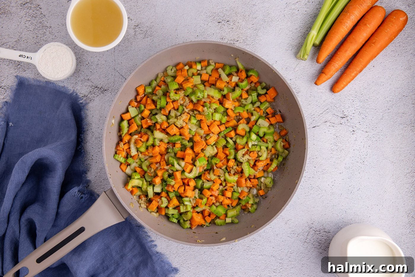 Easy Chicken Pot Pie Bake 6 sauteed carrots, onion, and celery in a skillet with butter