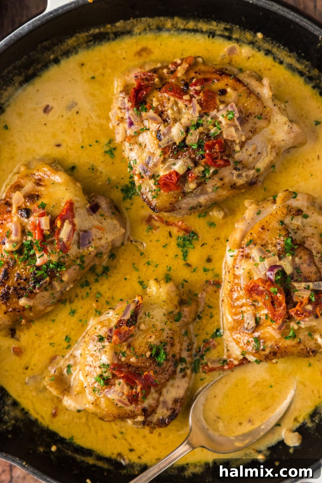 Close up photo of Skillet Chicken Thighs in a creamy sauce