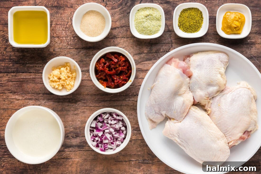 Ingredients for Skillet Chicken Thighs laid out on a cutting board