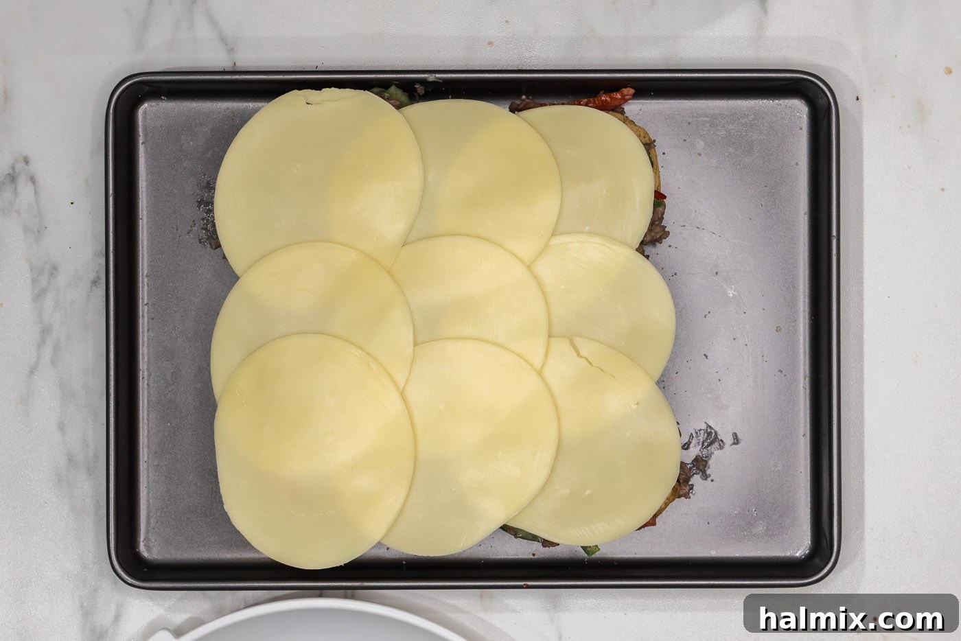 provolone cheese on top of beef sliders