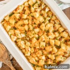 overhead shot of cheese potatoes in a casserole dish