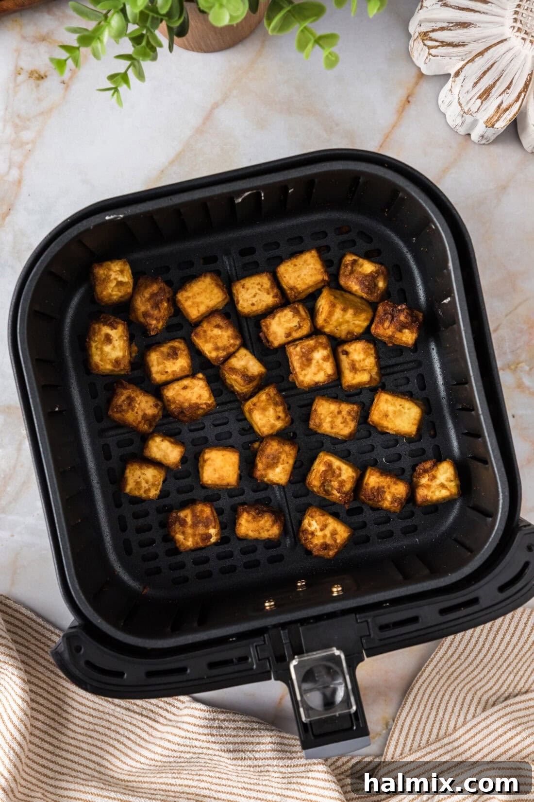Unbelievably Crispy Air Fryer Tofu 11 Air Fryer Tofu in an Air Fryer Basket