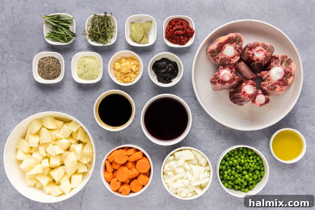 Melt-in-Your-Mouth Slow Cooker Oxtail 4 A flat lay photo showing ingredients for Slow Cooker Oxtail, including oxtail, vegetables, herbs, and sauces.