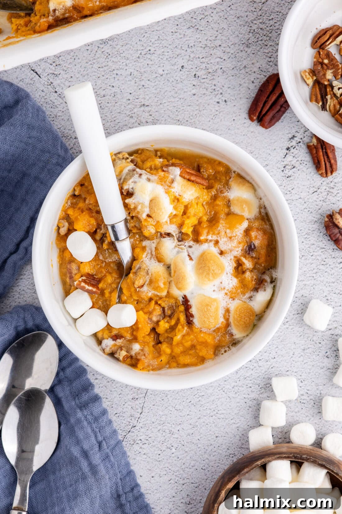 Heavenly Sweet Potato Bake 5 Bowl of Sweet Potato Casserole topped with toasted marshmallows