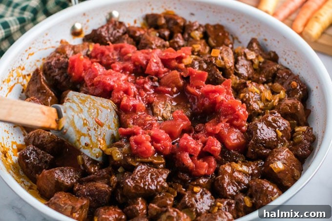 tomatoes added to the skillet