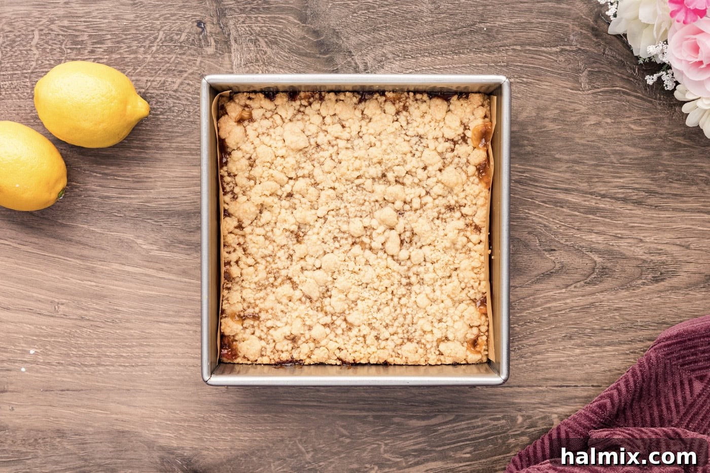 Freshly baked Lemon Streusel Squares in a 9x9 inch pan, golden brown and set