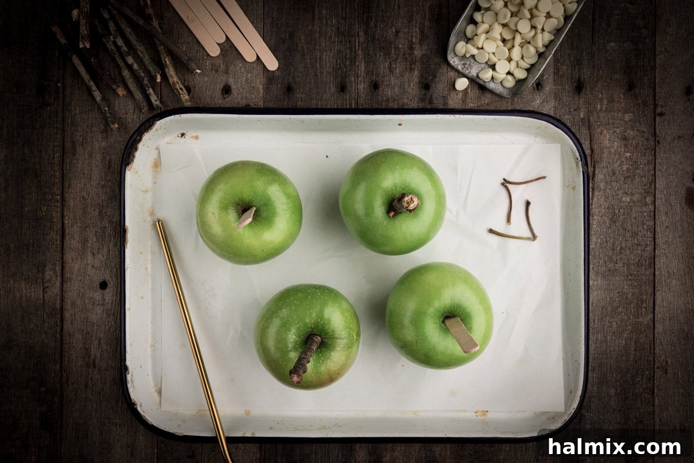 apples with a skewer stuck in them