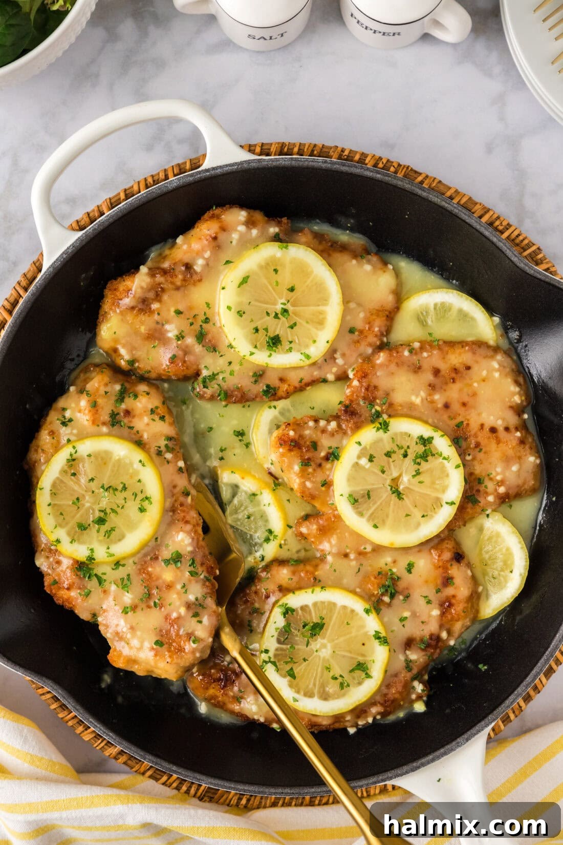 Skillet of Crispy Lemon Chicken with Garlic Butter Sauce