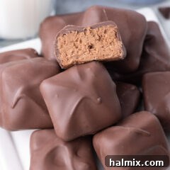 Creamy Cloud Bites 14 Close up photo of a Cool Whip Candy cut in half, revealing its fluffy texture.