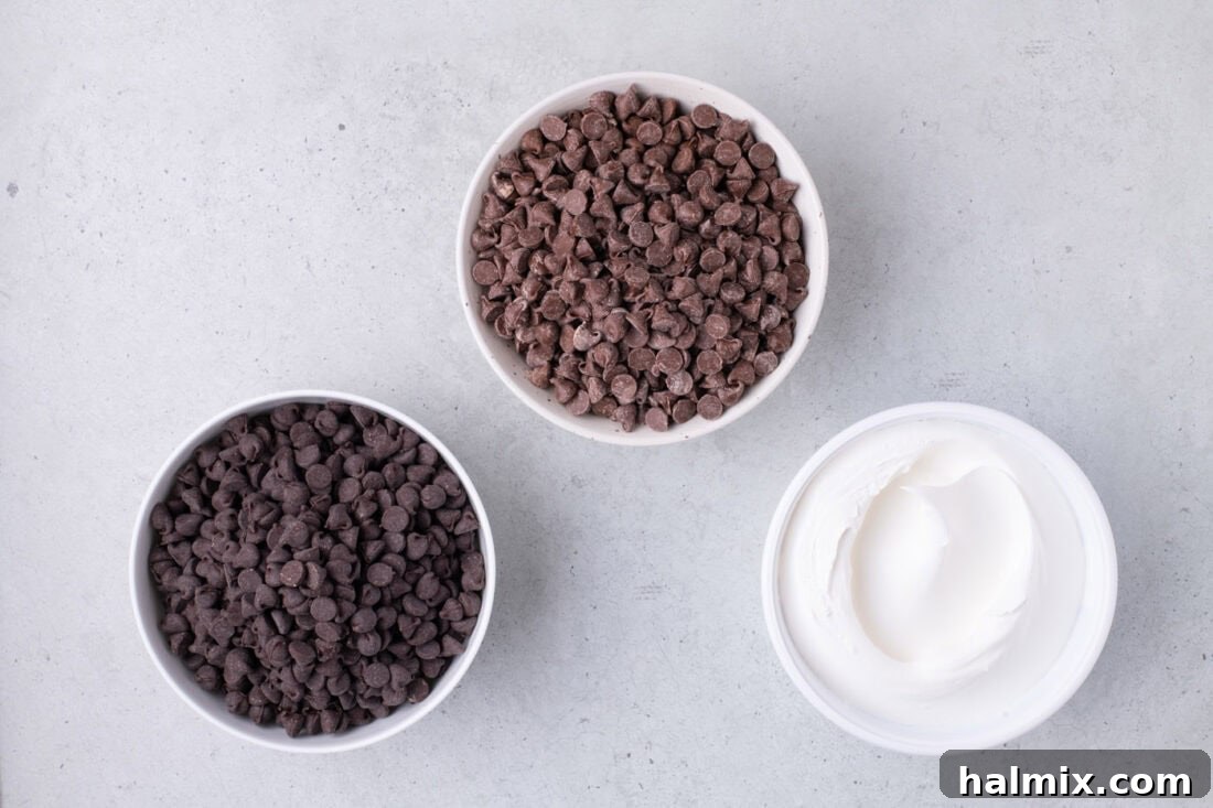 Creamy Cloud Bites 4 Cool Whip, milk chocolate chips, and semi-sweet chocolate chips laid out as ingredients for the candy recipe.