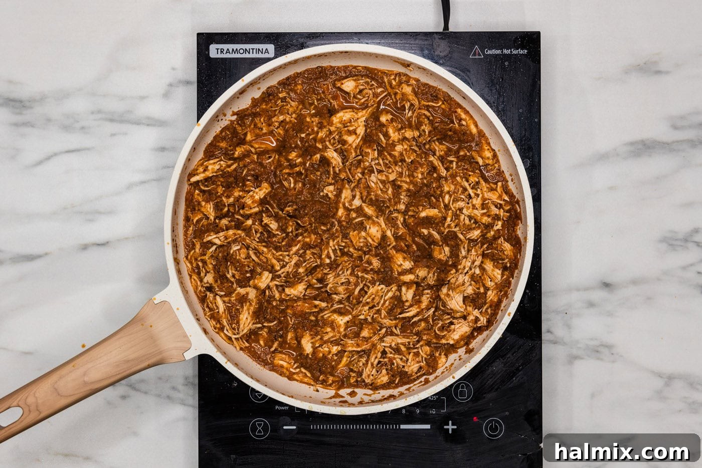 overhead of chicken tinga on the stovetop