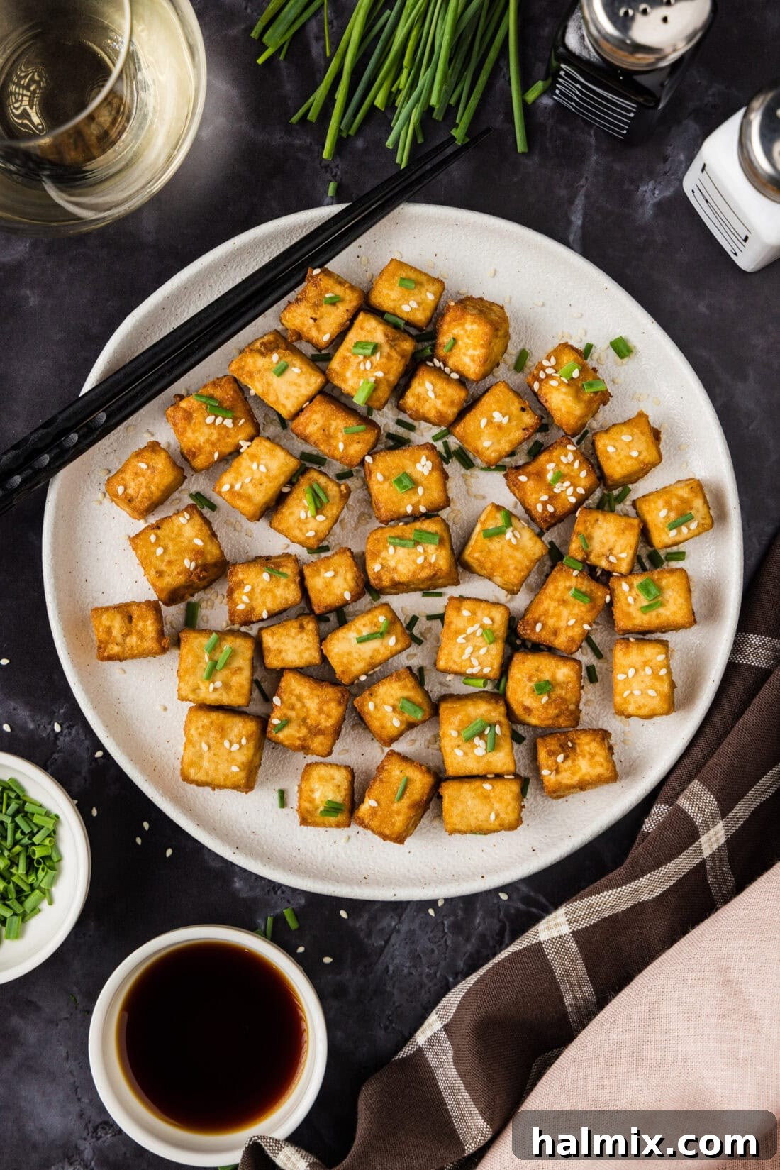 Plate of Fried Tofu with chopsticks resting on the plate
