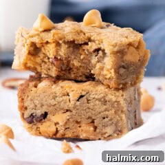 Stack of Butterscotch Brownies with a bite removed from the top one