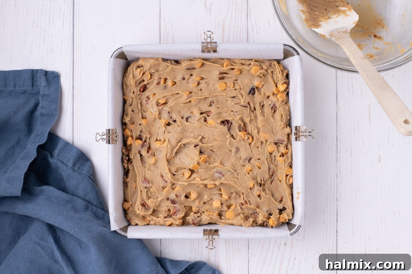 butterscotch brownie batter in a baking pan