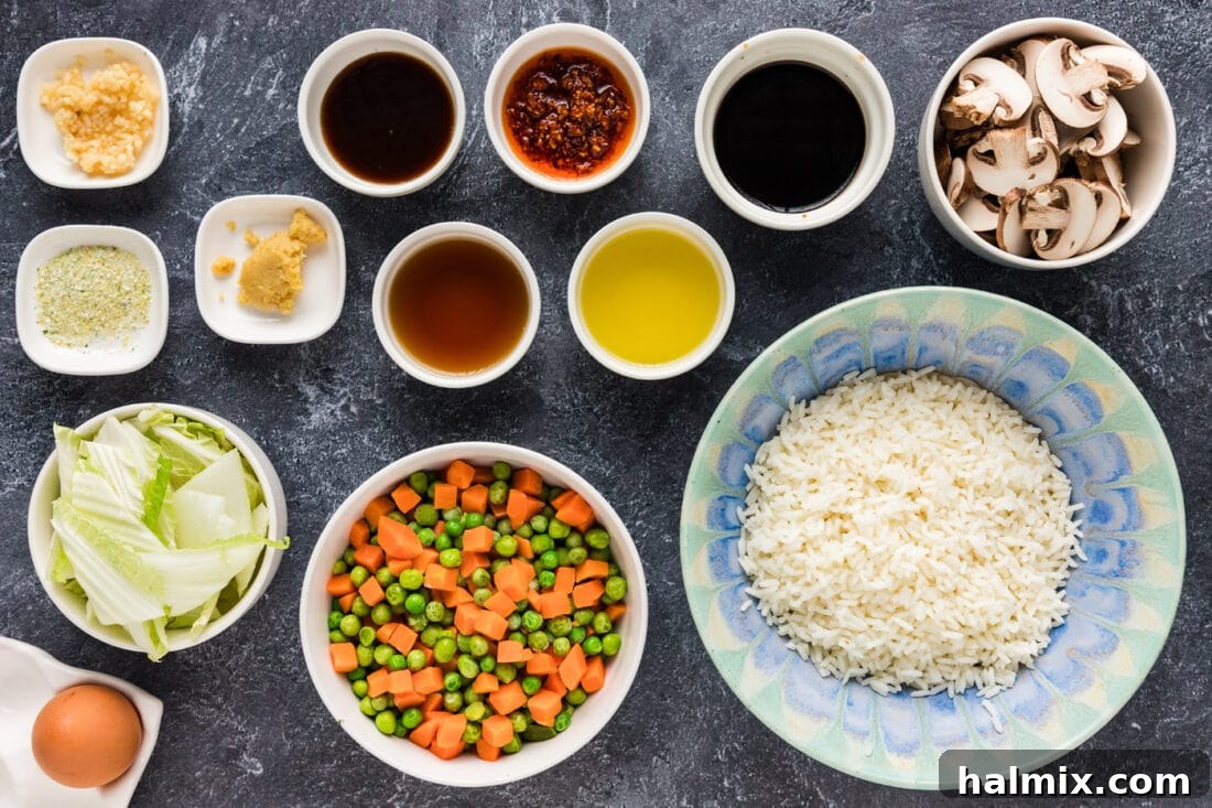 Assortment of fresh ingredients laid out for Korean Fried Rice preparation