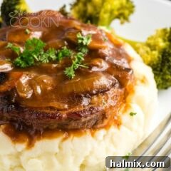 swiss steak on mashed potatoes