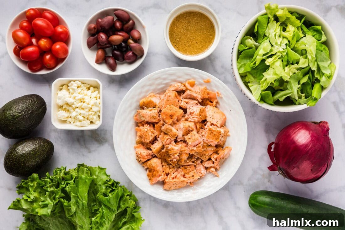 Vibrant Salmon Power Bowl 4 A flat lay image displaying all the fresh ingredients required to make Salmon Salad