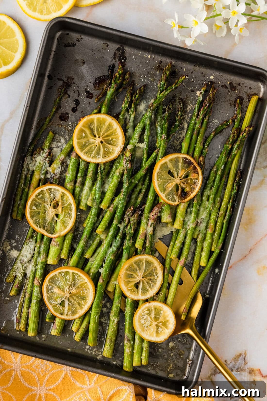 Bright Lemon Asparagus 10 Sheet pan of roasted Lemon Asparagus with melted Parmesan, ready to serve