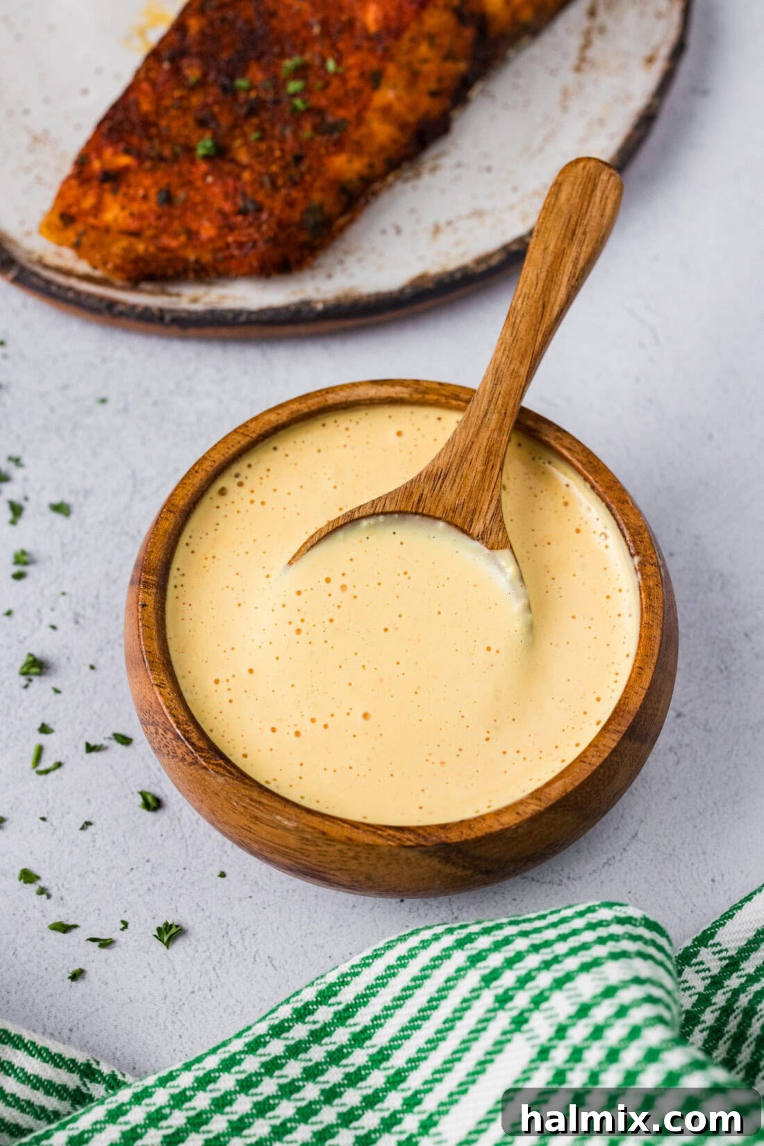 Bowl of Remoulade Sauce with a spoon in it