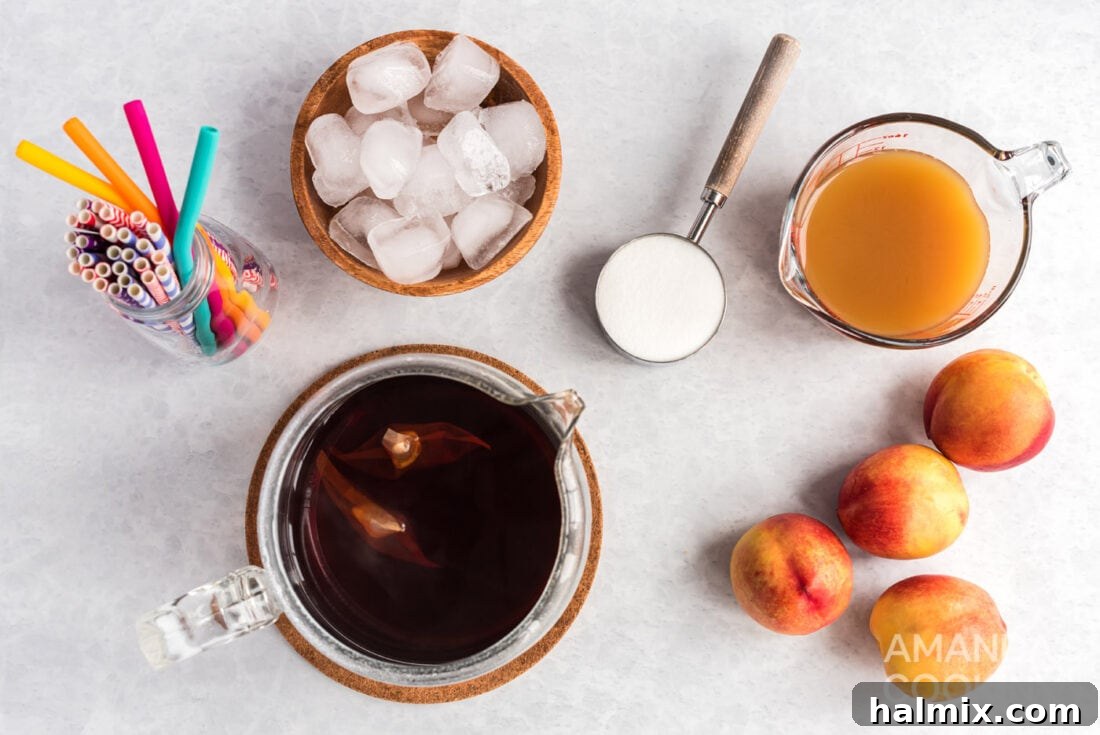 Sun-Kissed Peach Tea 4 Ingredients for Olive Garden copycat peach tea laid out on a table.