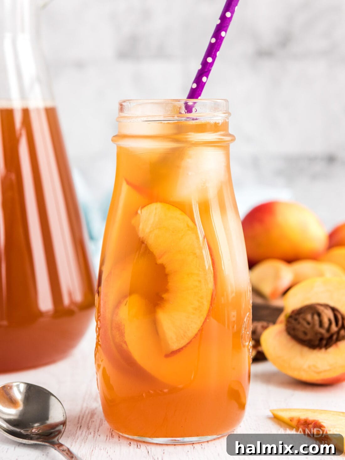 Sun-Kissed Peach Tea 8 Bottle of homemade peach iced tea, perfect for summer gatherings.